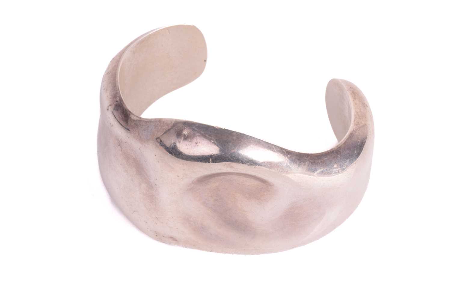 Lot 196 - Tiffany & Co. - a 'Virgo' silver cuff from the...