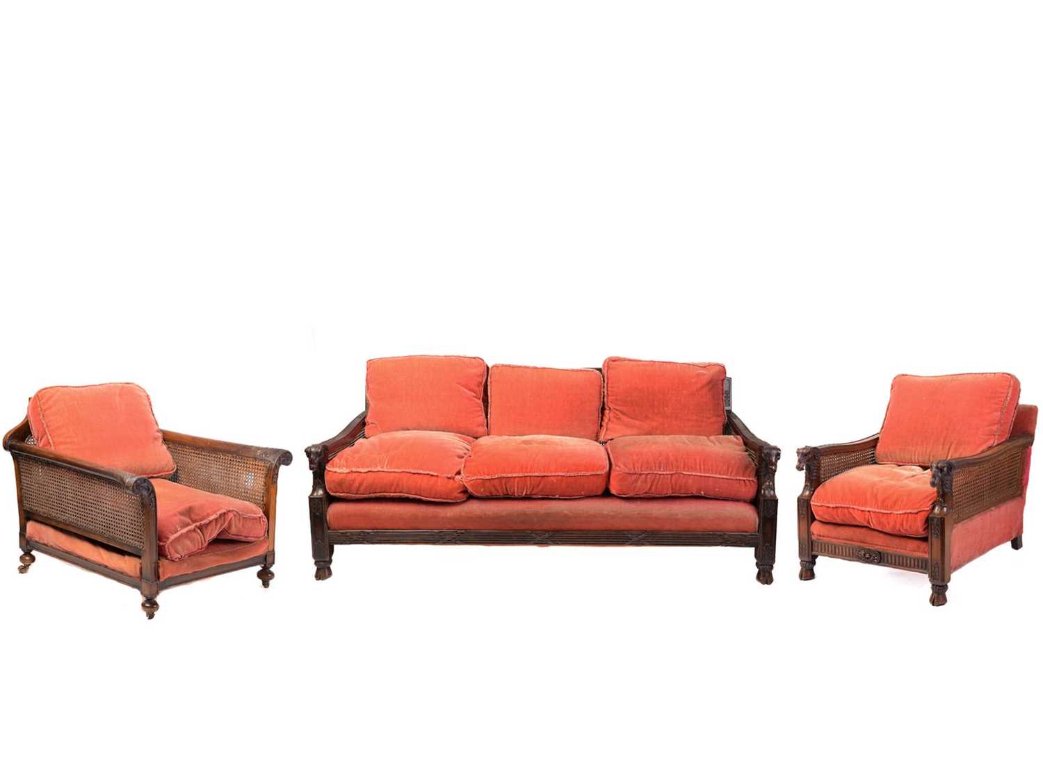 Lot 217 - A carved walnut three-seat Bergere sofa and...