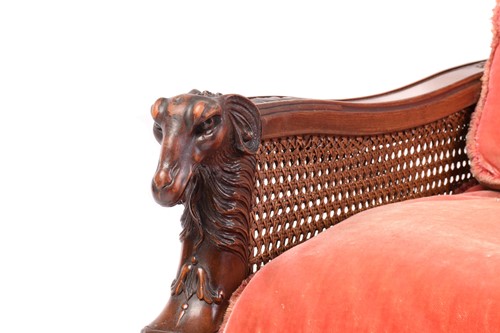 Lot 217 - A carved walnut three-seat Bergere sofa and...