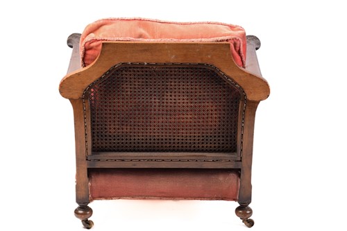 Lot 217 - A carved walnut three-seat Bergere sofa and...