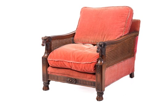 Lot 217 - A carved walnut three-seat Bergere sofa and...