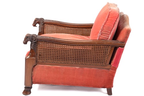 Lot 217 - A carved walnut three-seat Bergere sofa and...