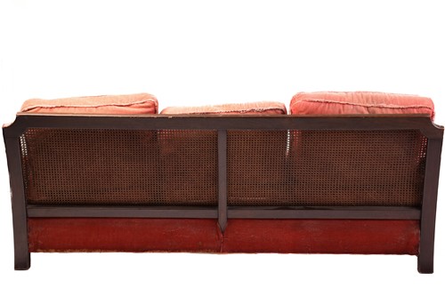 Lot 217 - A carved walnut three-seat Bergere sofa and...