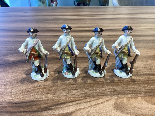 Lot 392 - A group of seven Meissen porcelain soldier...