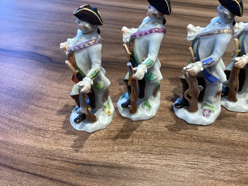 Lot 392 - A group of seven Meissen porcelain soldier...