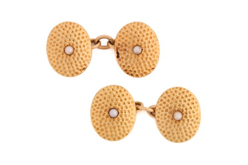 Lot 9 - A pair of 18ct gold and seed pearl oval panel...