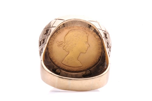 Lot 32 - A sovereign coin ring in 9ct gold, comprising...