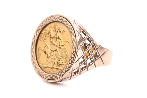 Lot 32 - A sovereign coin ring in 9ct gold, comprising...