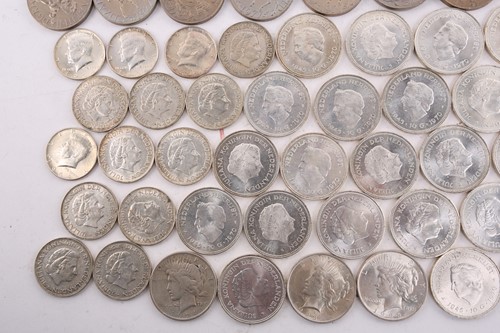 Lot 272 - A collection of silver content coins,...