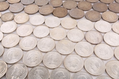 Lot 272 - A collection of silver content coins,...