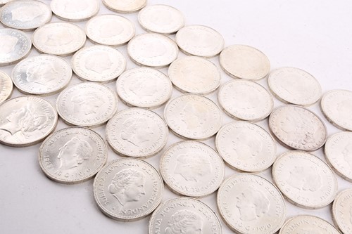 Lot 272 - A collection of silver content coins,...