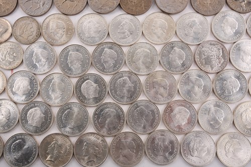Lot 272 - A collection of silver content coins,...
