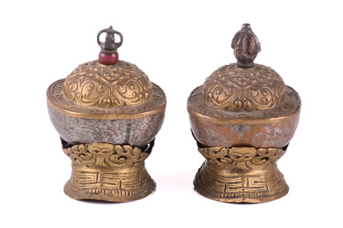 Lot 134 - A close pair of Tibetan kapala and stands,...