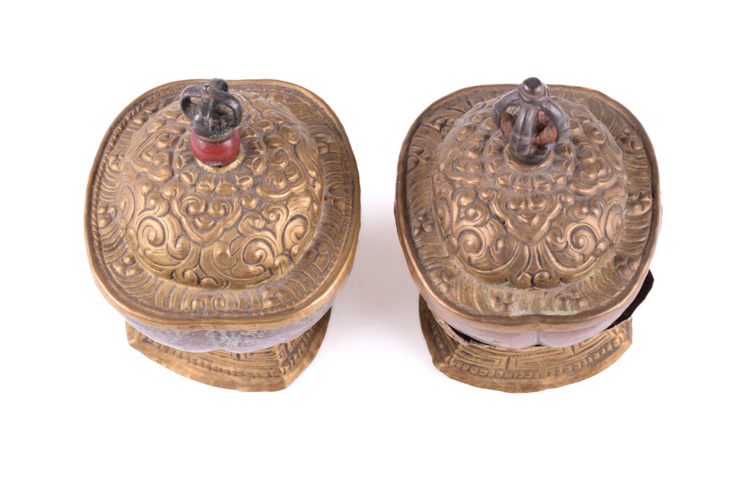 Lot 134 - A close pair of Tibetan kapala and stands,