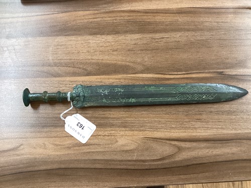 Lot 163 - A Chinese bronze sword, Han Dynasty (206 BC-...