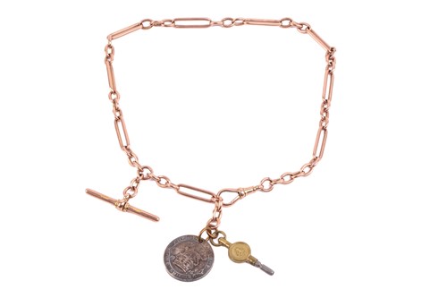 Lot 143 - A 9ct rose gold Albert chain with a coin charm...