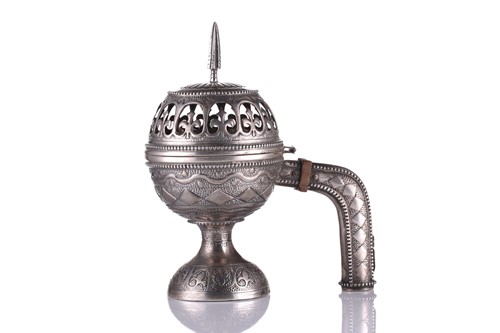 Lot 424 - An Omani silver incense burner (Majmar), early...