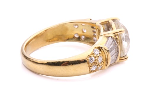 Lot 54 - A diamond dress ring, claw-set with an old-cut...