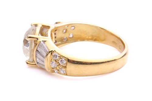 Lot 54 - A diamond dress ring, claw-set with an old-cut...