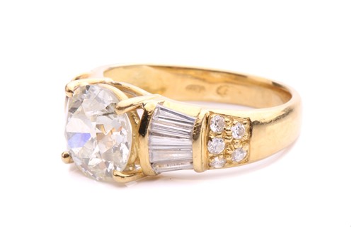 Lot 54 - A diamond dress ring, claw-set with an old-cut...