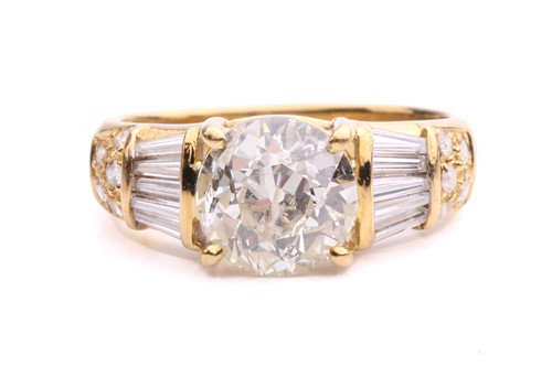 Lot 54 - A diamond dress ring, claw-set with an old-cut...