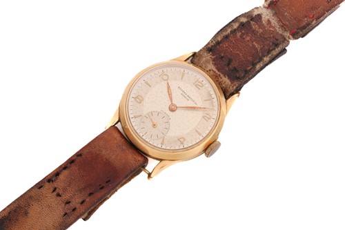 Lot 351 - A Record Watch Co. Geneve 18ct yellow gold...