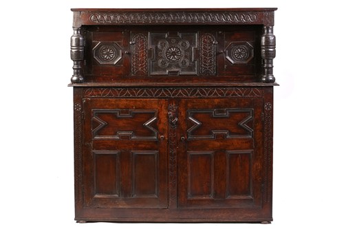 Lot 324 - A part 17th century joined oak court cupboard,...