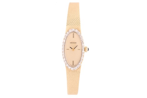 Lot 353 - A ladies Movado 14ct yellow gold mechanical...