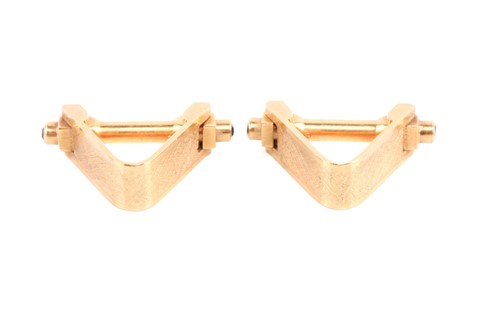 Lot 3 - A pair of stirrup cufflinks, embellished with...