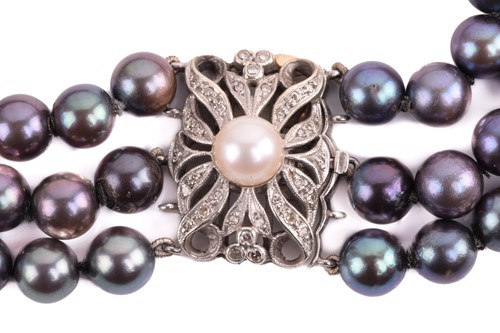 Lot 158 - A Tahitian pearl necklace with a diamond-set...