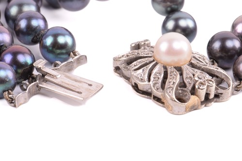 Lot 158 - A Tahitian pearl necklace with a diamond-set...