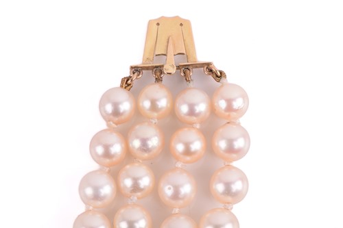 Lot 162 - A four-row cultured pearl necklace, comprising...