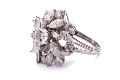 Lot 13 - A diamond spray ring, in the centre of the...