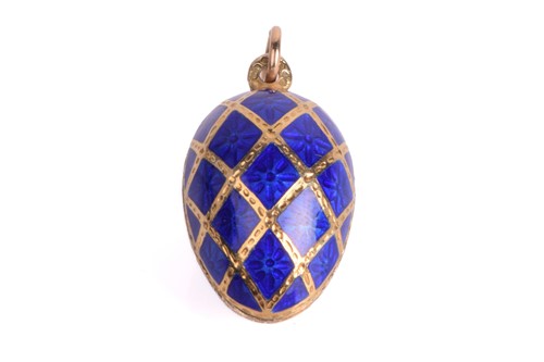 Lot 232 - An enamel egg pendant in 9ct yellow gold, the...