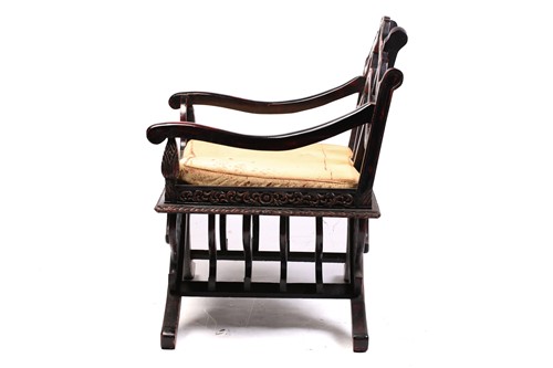 Lot 359 - A Burmese carved and red lacquered Howdar seat...