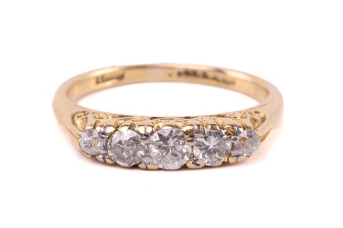 Lot 212 - A five-stone diamond ring set with a row of...