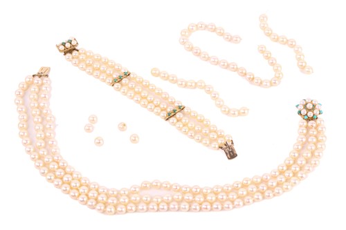 Lot 5 - A three string pearl necklace and bracelet...