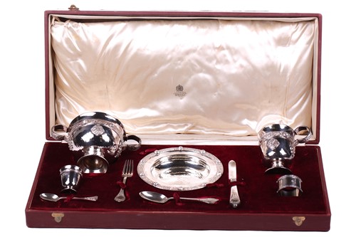 Lot 417 - Asprey. A comprehensive ten piece christening...