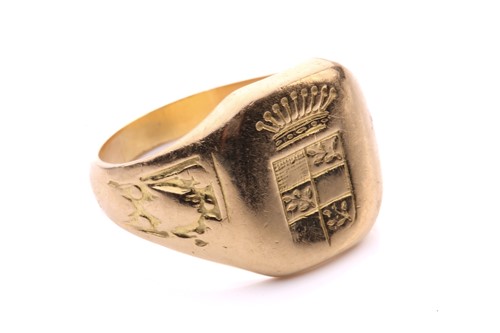 Lot 226 - A signet ring with a heraldic design, the...