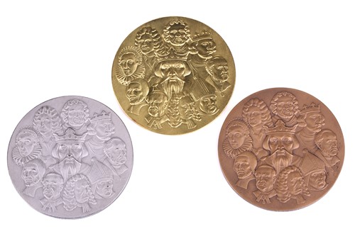 Lot 339 - A Royal Mint commemorative three-medal set:...