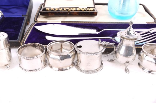 Lot 454 - A cased Edwardian silver egg cup and spoon,...
