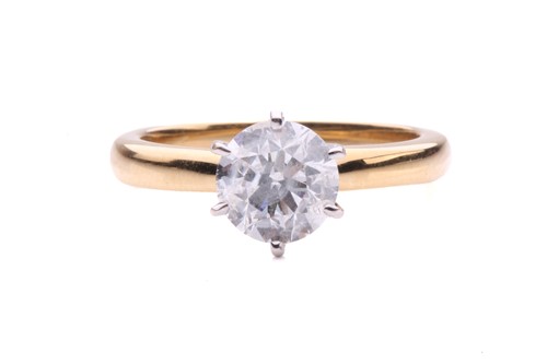 Lot 57 - A diamond solitaire ring in 18ct gold, centred...