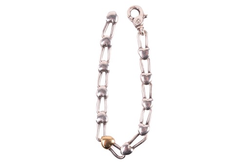 Lot 153 - Tiffany. A silver star link necklace, London...