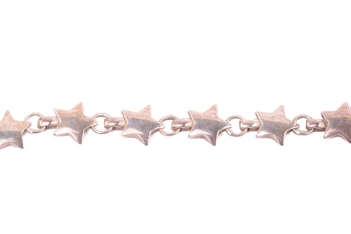 Lot 153 - Tiffany. A silver star link necklace, London...