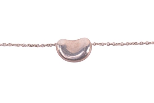 Lot 153 - Tiffany. A silver star link necklace, London...