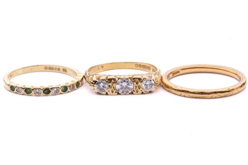 Lot 233 - A 22ct gold wedding band and two 18ct gold gem-...