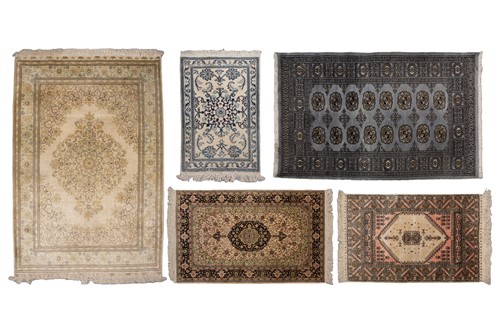 Lot 368 - A faded ivory ground Qum silk on silk rug,...