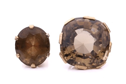 Lot 212 - A large statement smokey quartz ring and...