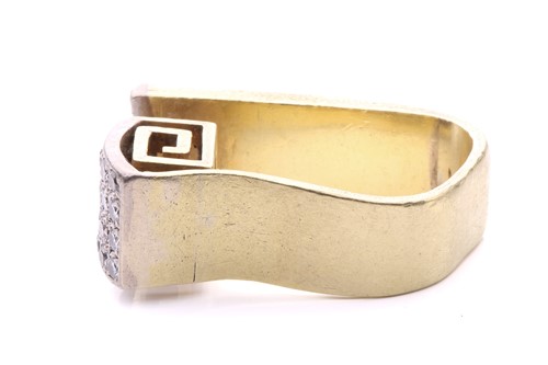 Lot 224 - A modernist diamond ring with a greek key...