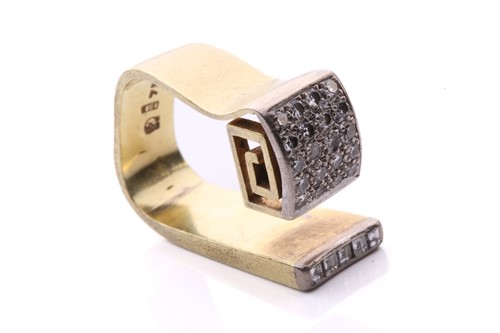 Lot 224 - A modernist diamond ring with a greek key...